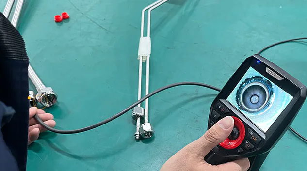 A borescope inspecting an internal pipe weld