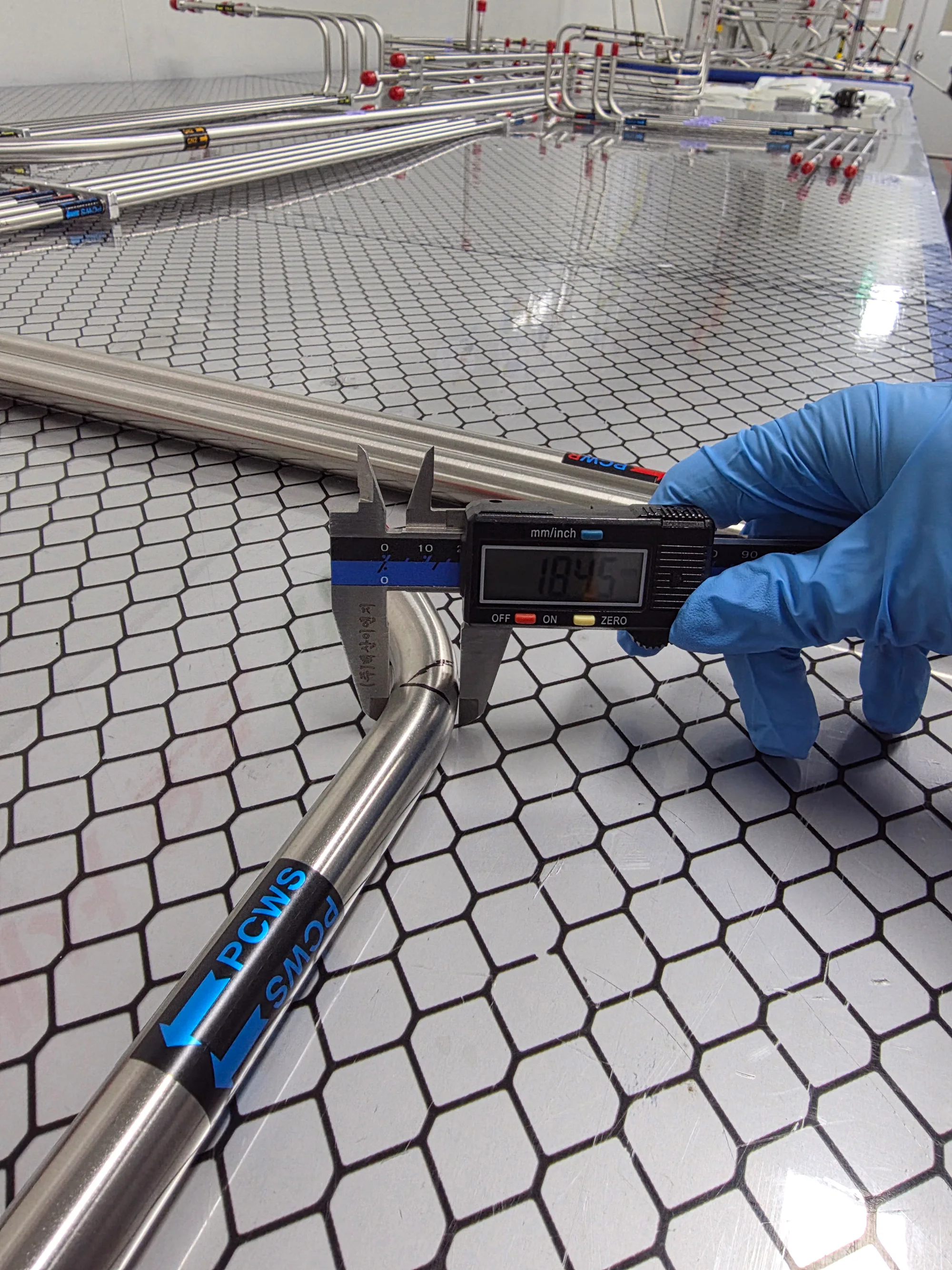 A vernier caliper measuring pipe ovality and outside diameter